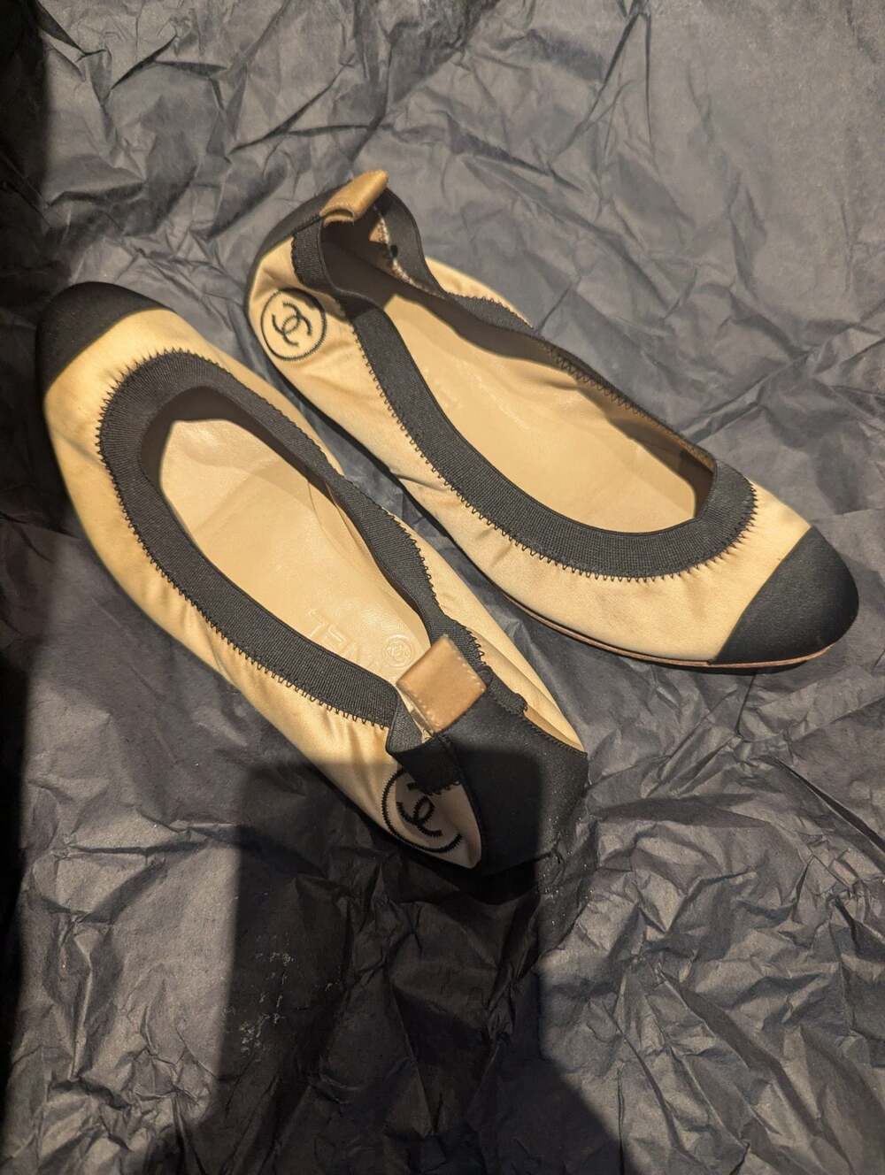 Tan and black Chanel ballet flats. - Picture 1 of 5